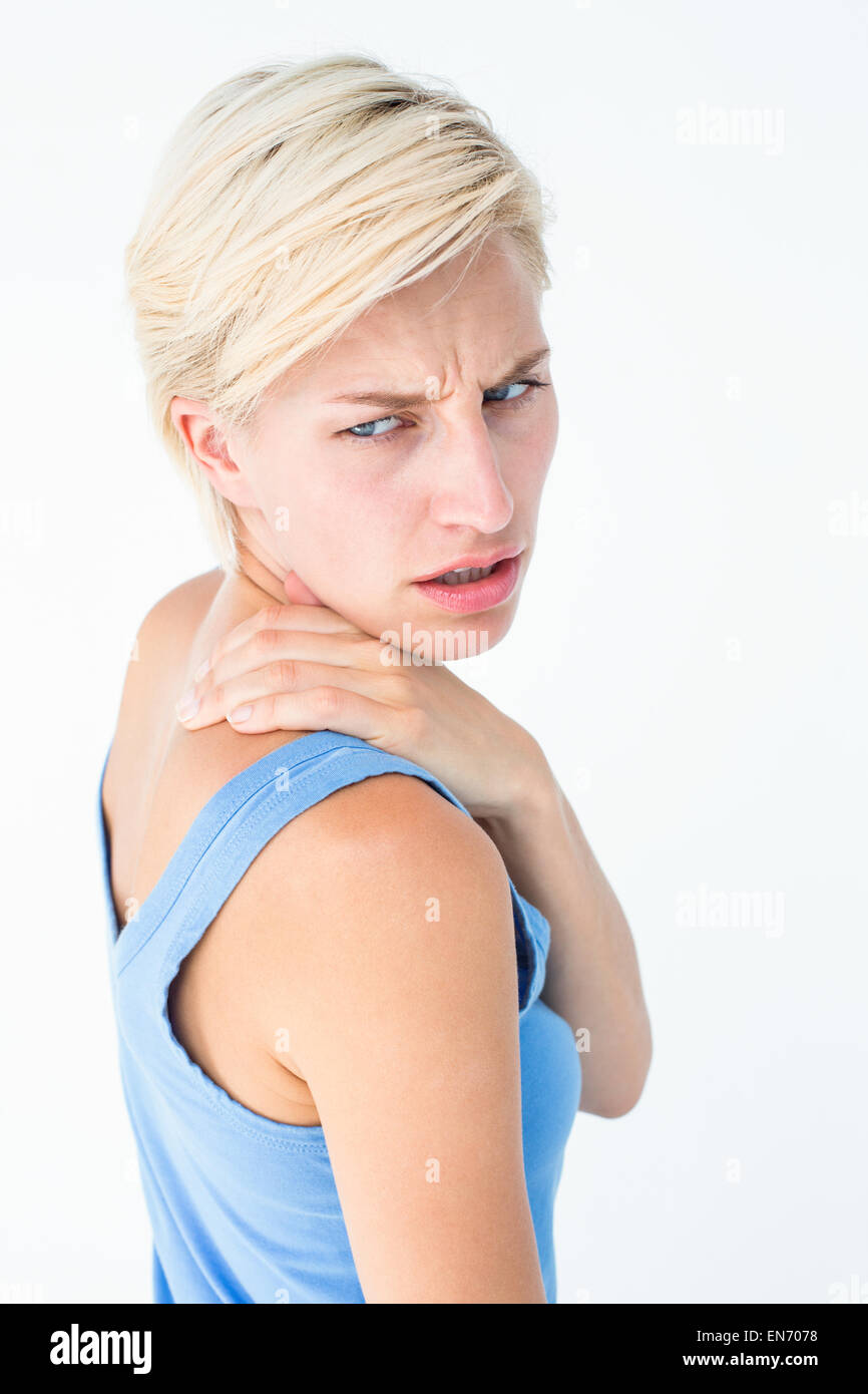 Casual woman with neck pain Stock Photo Alamy