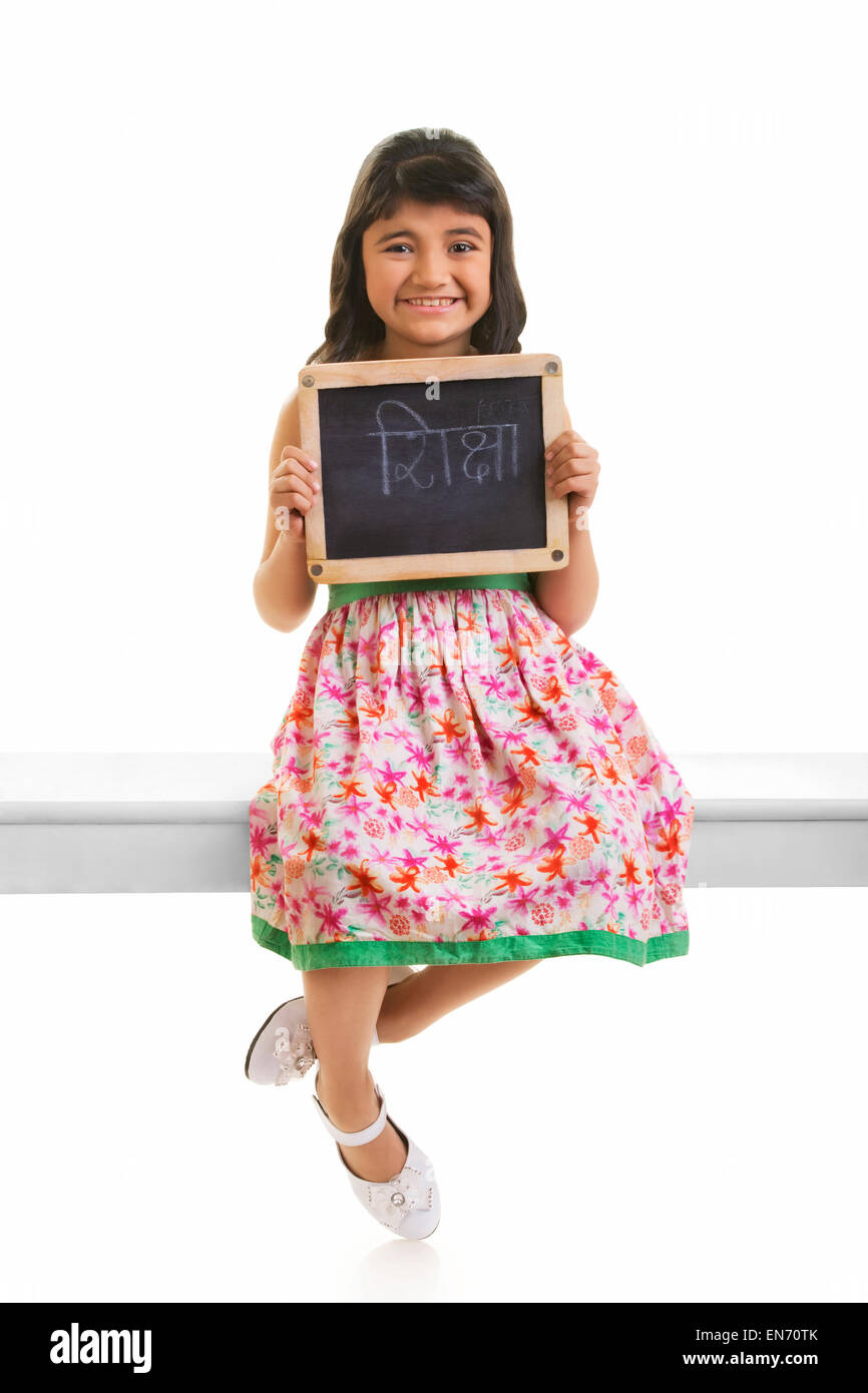 Girl holding black board Stock Photo