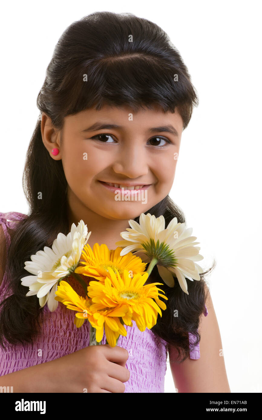 Girl holding flowers Stock Photo Alamy