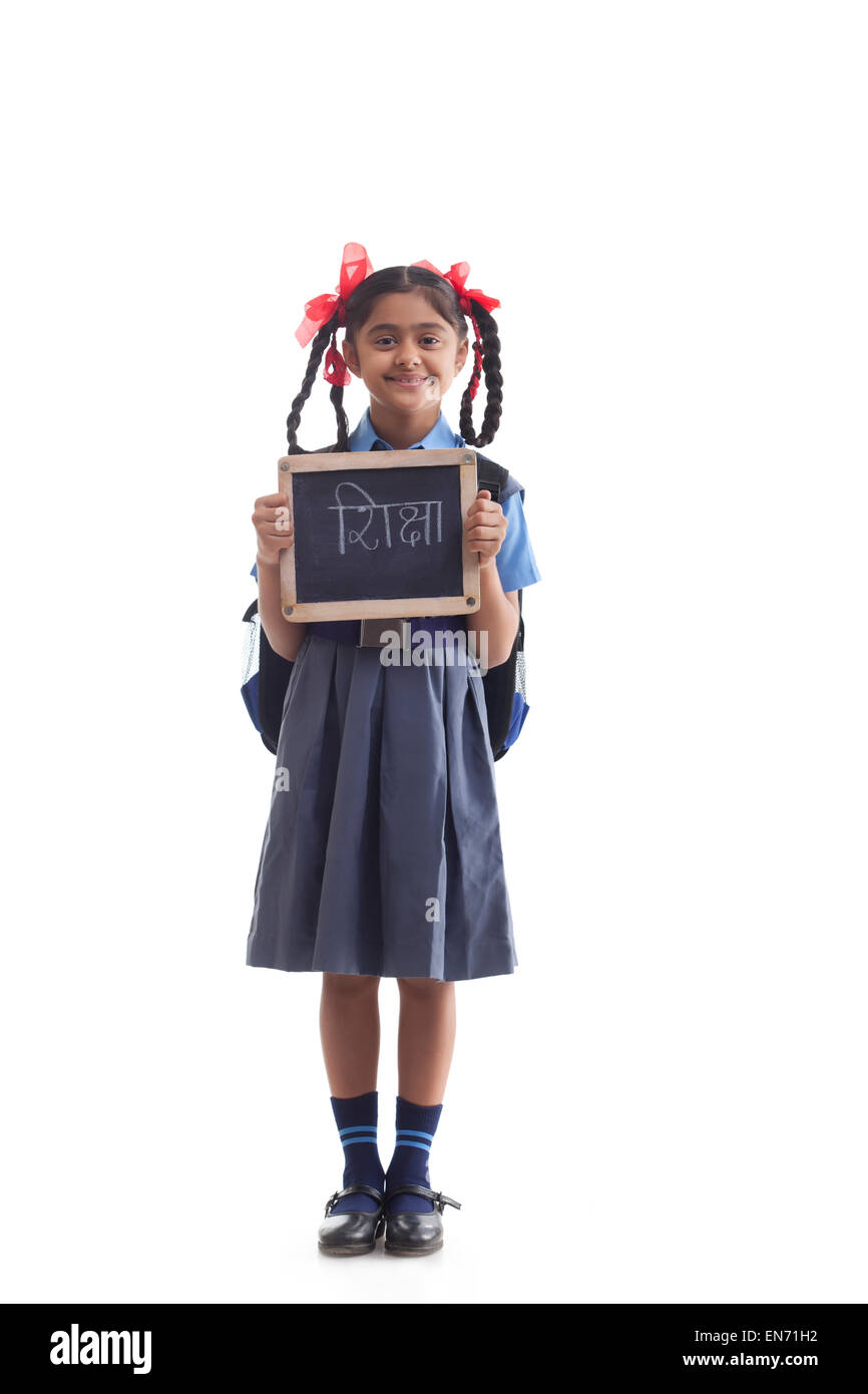 Portrait of school girl holding slate Stock Photo - Alamy