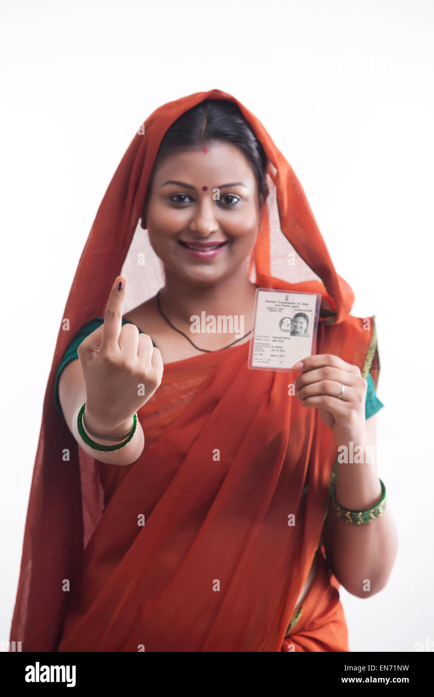 Portrait of rural woman with voters mark and identity card Stock Photo ...