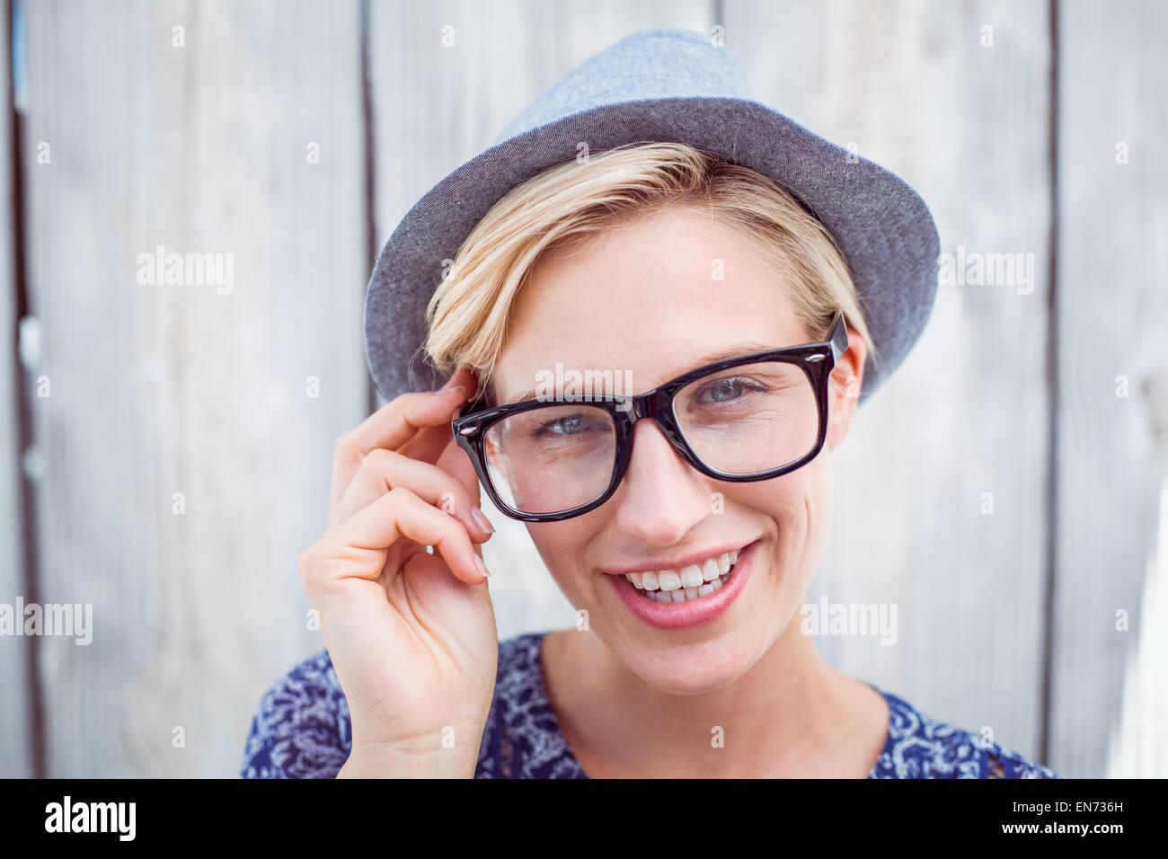Pretty blonde woman wearing hipster glasses Stock Photo