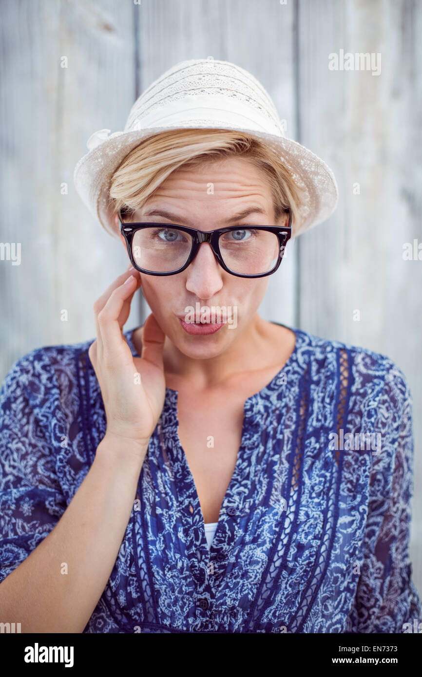Pretty blonde woman wearing hipster glasses Stock Photo