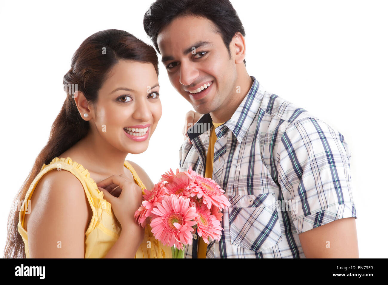 Couple holding flowers hi-res stock photography and images - Alamy