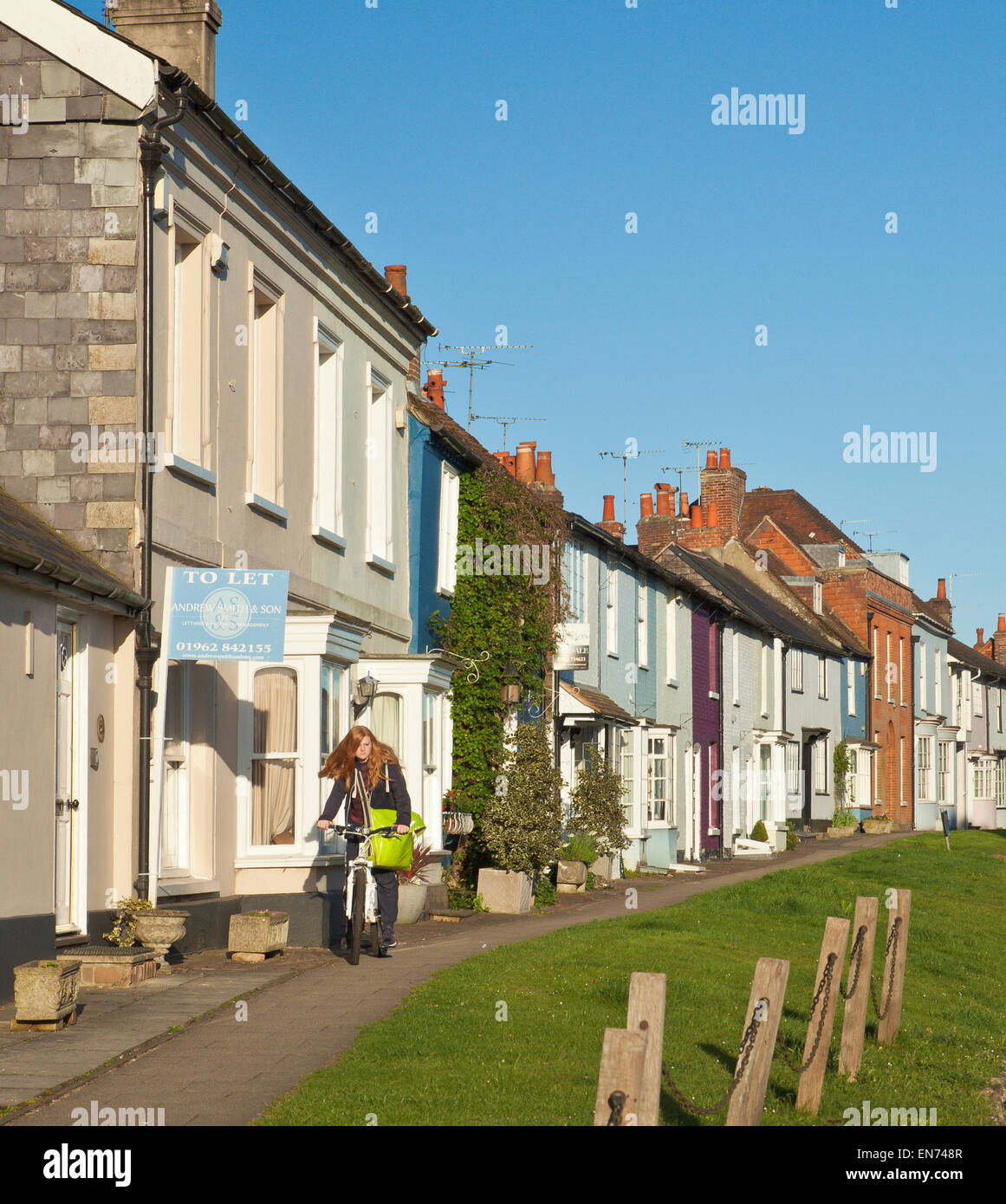 Girl on her paper delivery round. Stock Photo