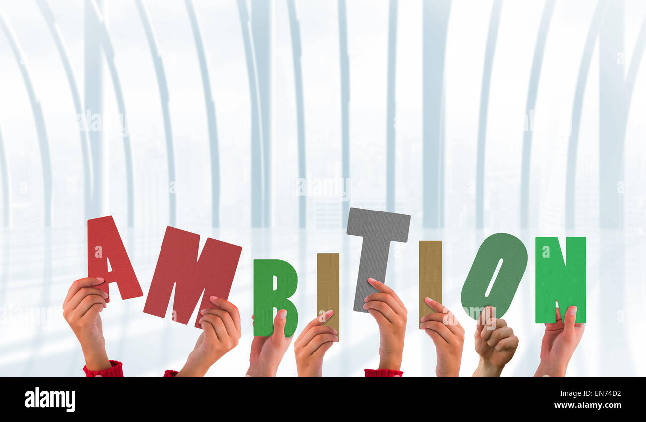 Composite image of hands showing ambition Stock Photo