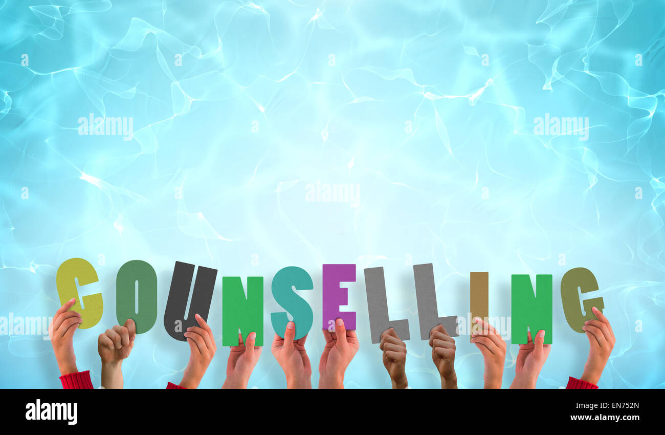 Composite image of hands holding up counselling Stock Photo