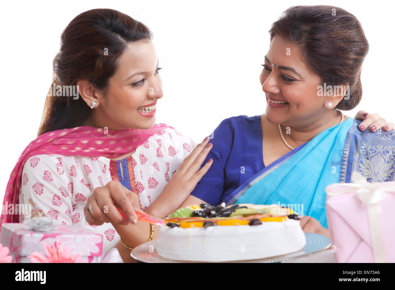 Mother and daughter with birthday cake Stock Photo