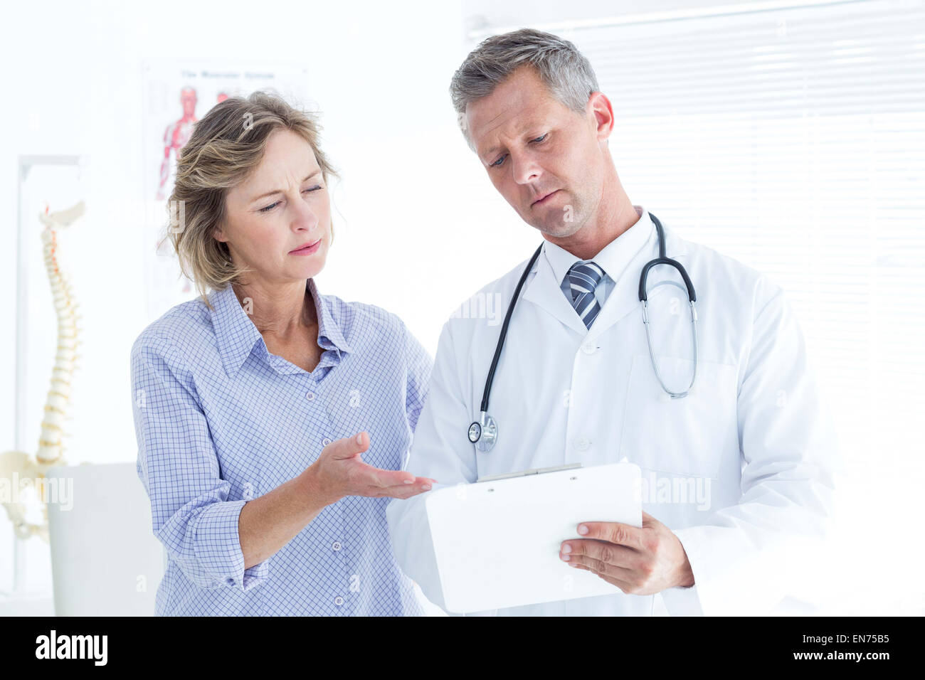 Patient doctor talking hi-res stock photography and images - Alamy