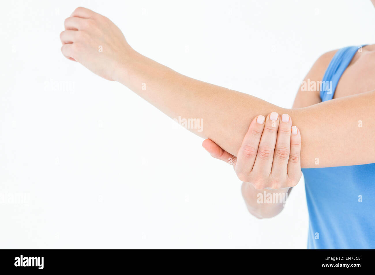 Woman touching her painful elbow Stock Photo