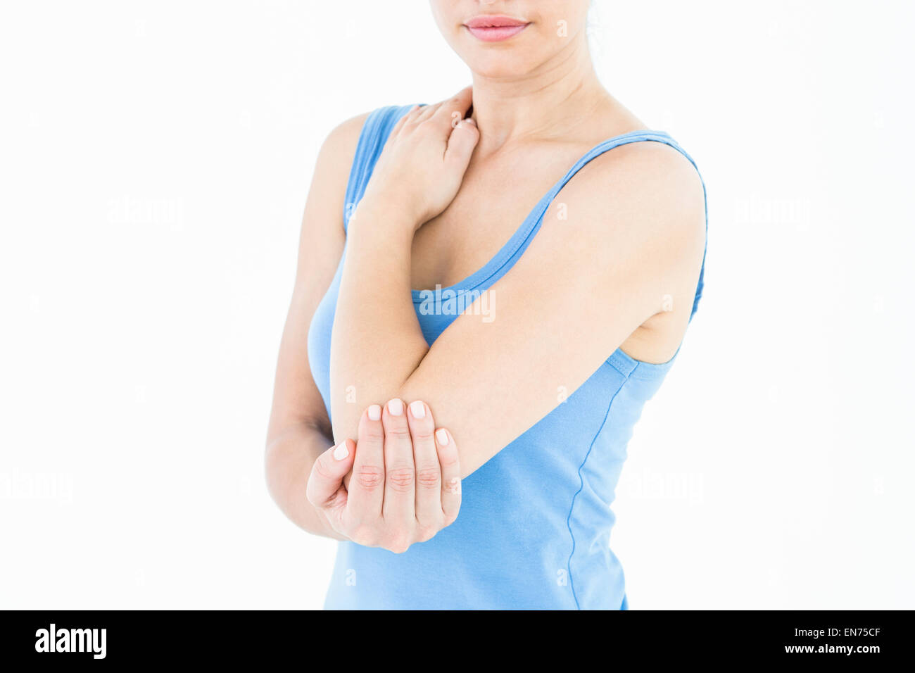 Woman touching her painful elbow Stock Photo