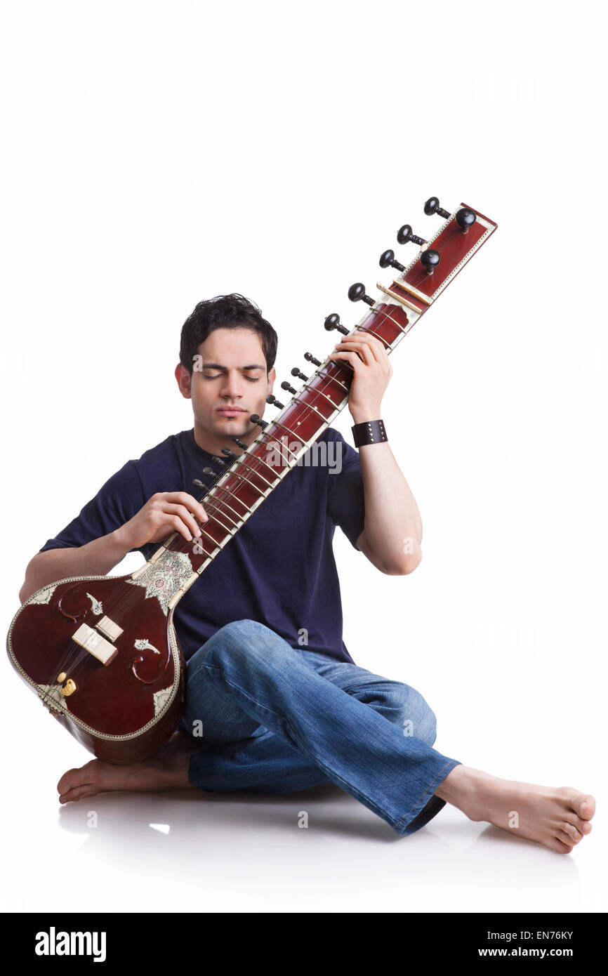 Indian man sitar Cut Out Stock Images & Pictures Alamy