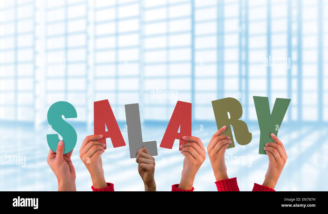 Composite image of hands showing salary Stock Photo