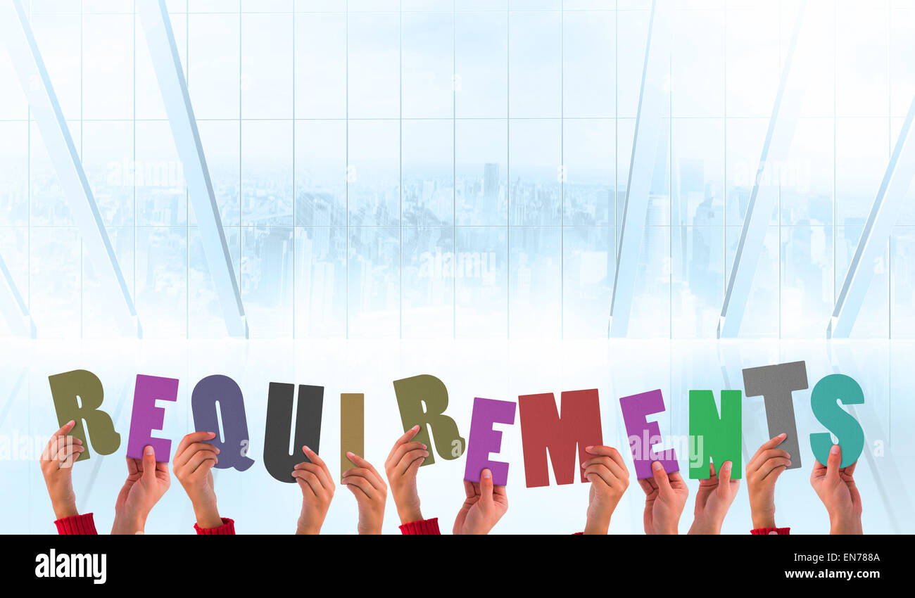 Composite image of hands holding up requirements Stock Photo