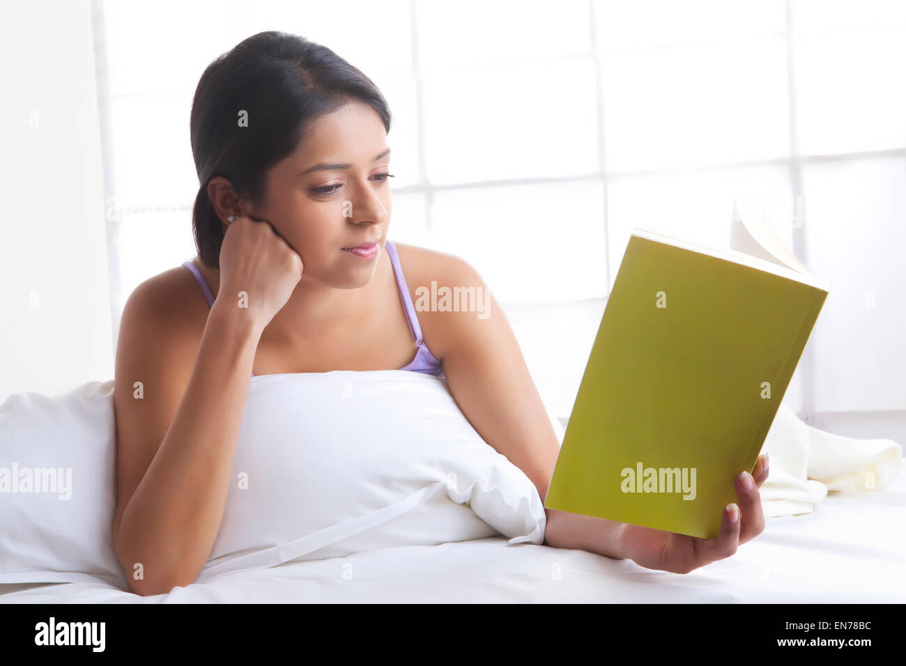 Indian girl reading book hi-res stock photography and images - Alamy