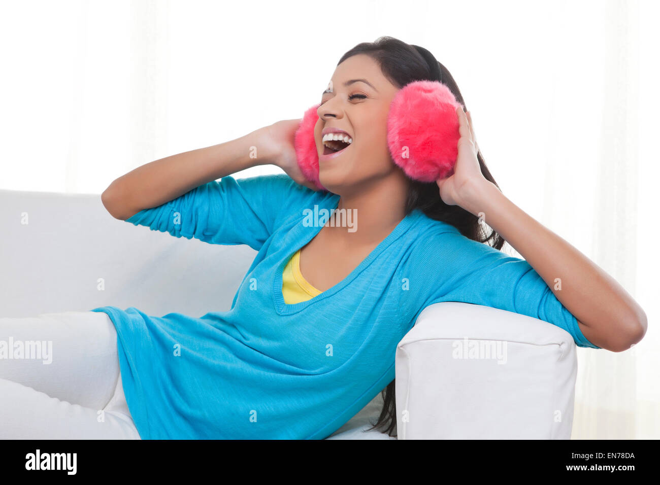 Girl with ear muffs Stock Photo Alamy