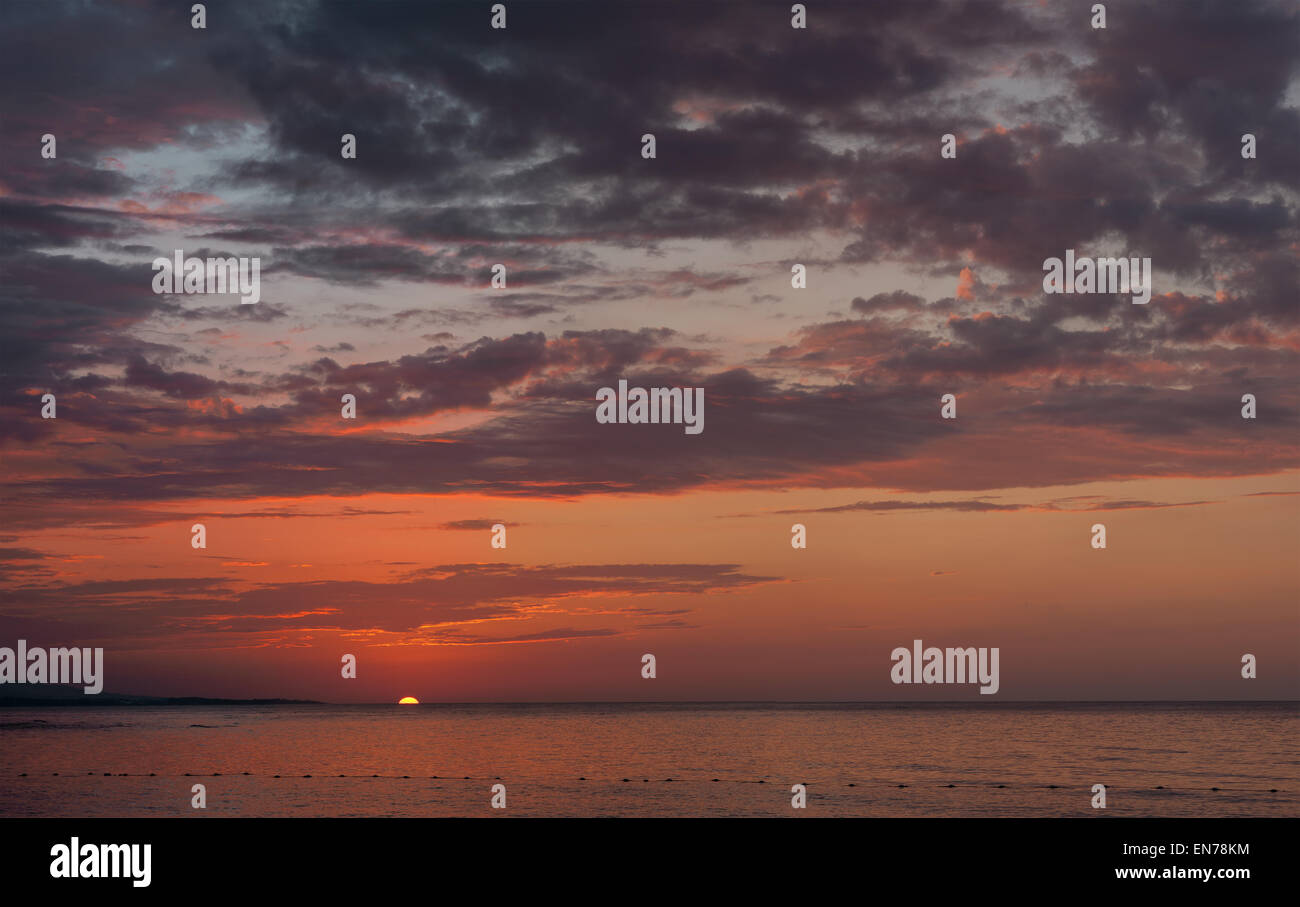 beautiful sunset at the beach Stock Photo - Alamy