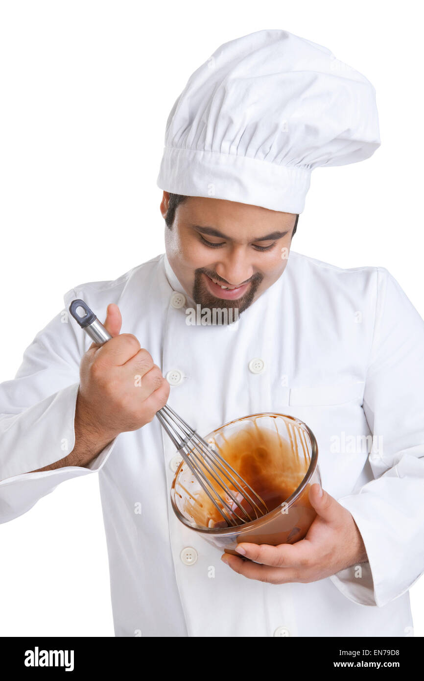 Chef mixing chocolate in a bowl Stock Photo Alamy