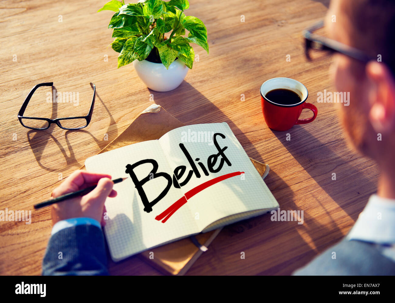 Businessman Brainstorming About Belief Stock Photo