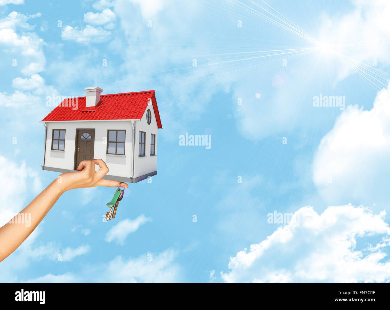 House and keys in businesswomans hand Stock Photo - Alamy