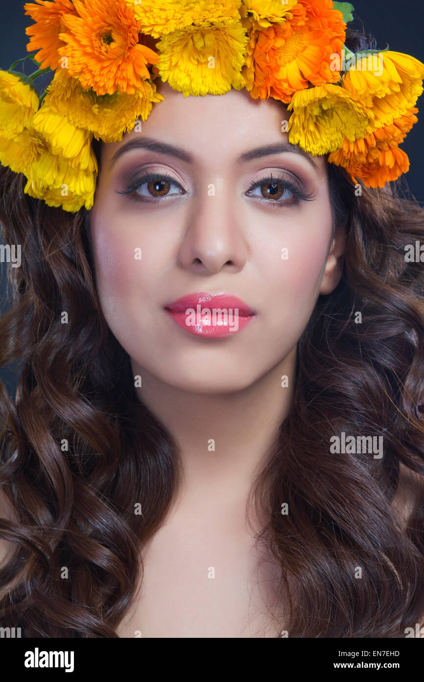 Portrait of a beautiful woman with flowers in her hair Stock Photo - Alamy