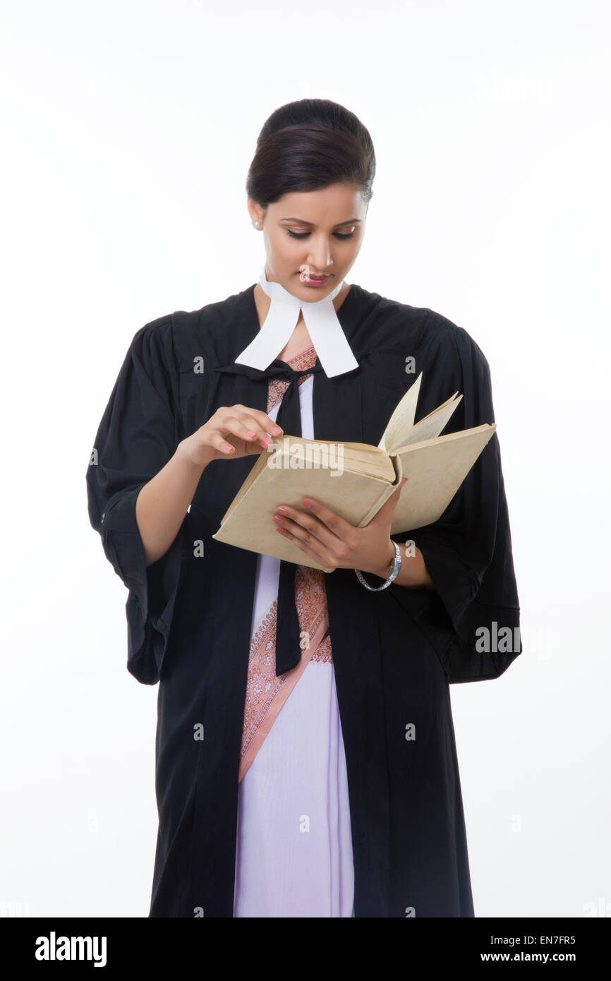 Female lawyer reading a book Stock Photo