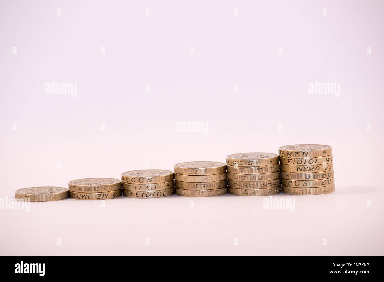 UK Pound Coins stacked in columns symbolising growth Stock Photo