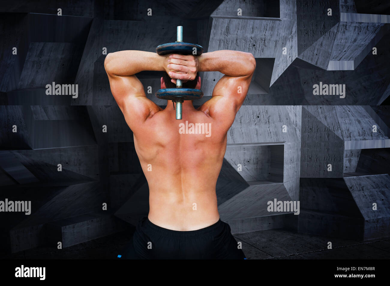 Composite image of bodybuilder lifting dumbbell Stock Photo