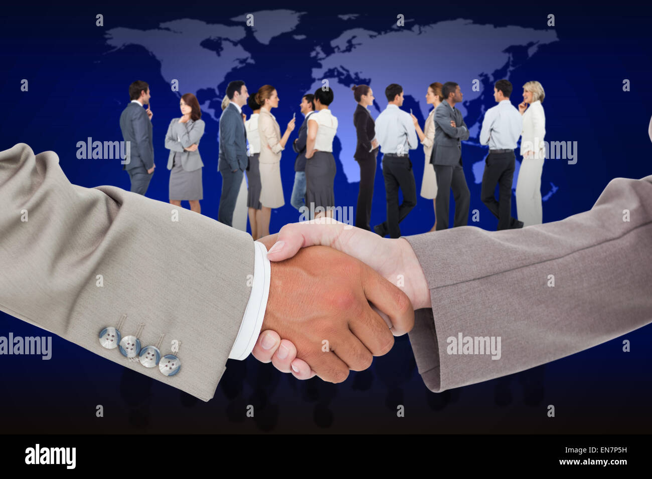 Composite image of side view of shaking hands Stock Photo