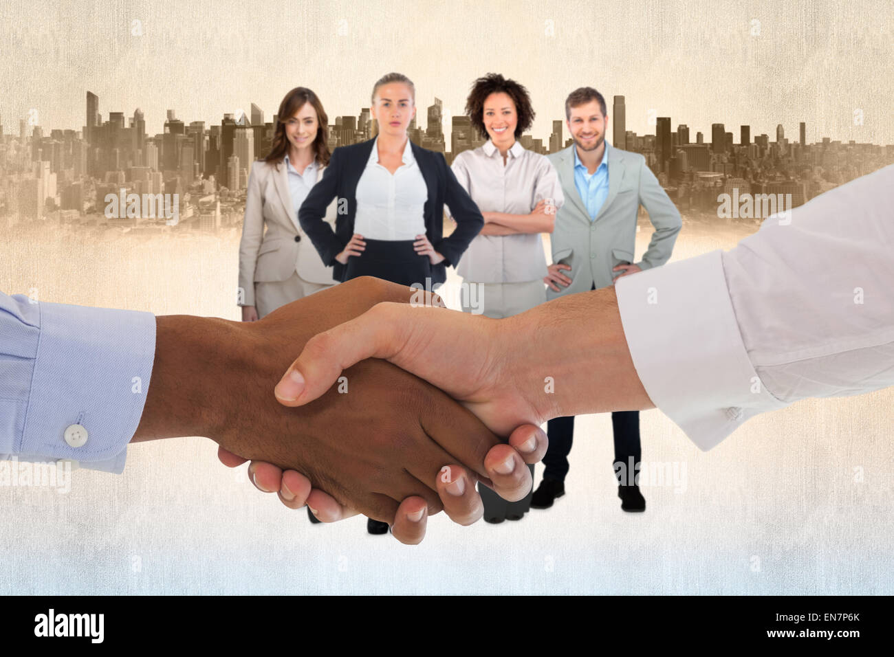 Composite image of close-up shot of a handshake in office Stock Photo