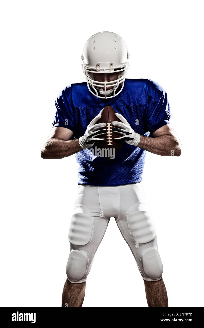 Football Player with a blue uniform and a ball in the hand on a white background. Stock Photo