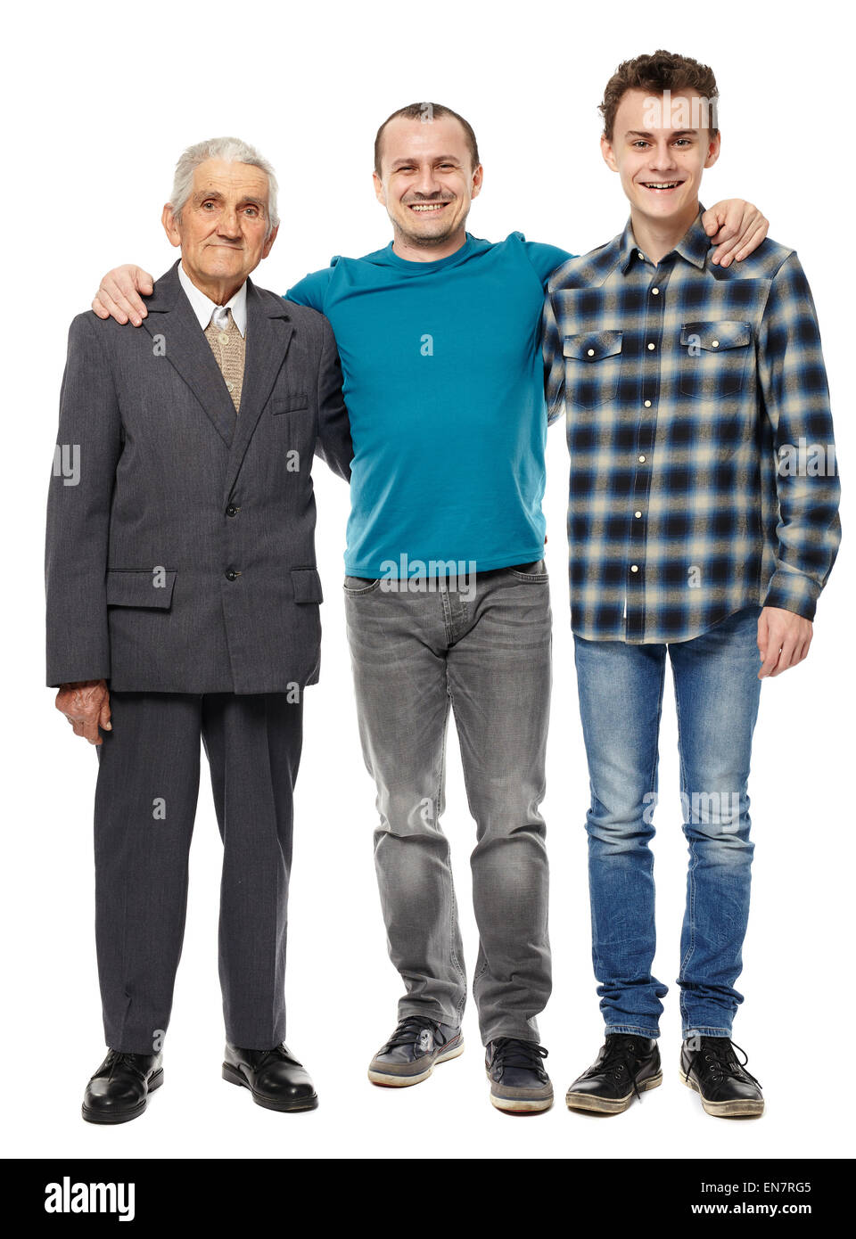 Male generations - grandfather, son and grandson in full length studio portrait Stock Photo
