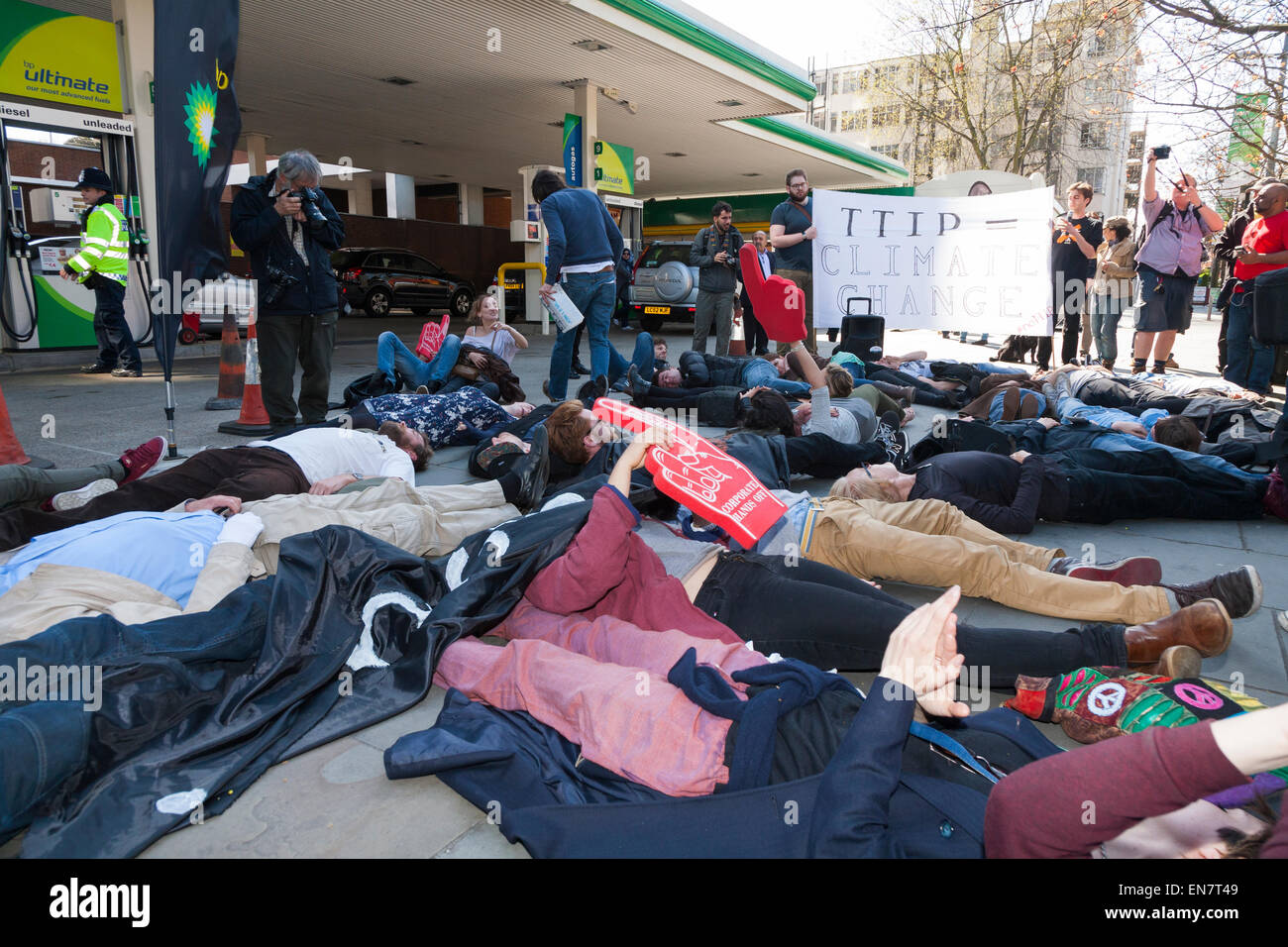 Protesters perform 'Die In' at BP / British Petroleum petrol filling ...