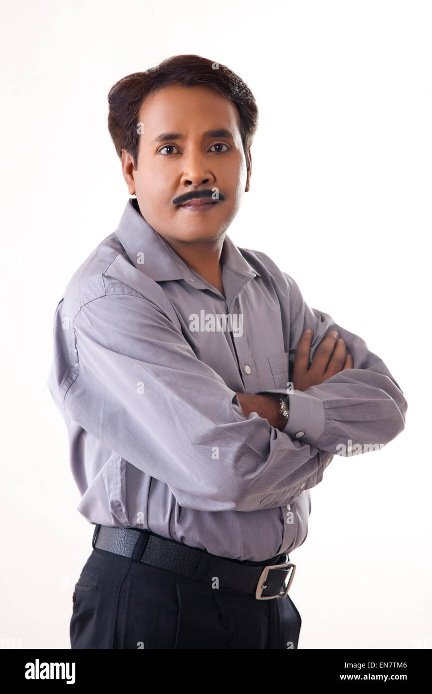 Portrait of businessman with arms crossed Stock Photo - Alamy