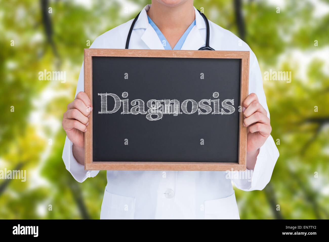 Diagnosis against low angle view of tall trees Stock Photo