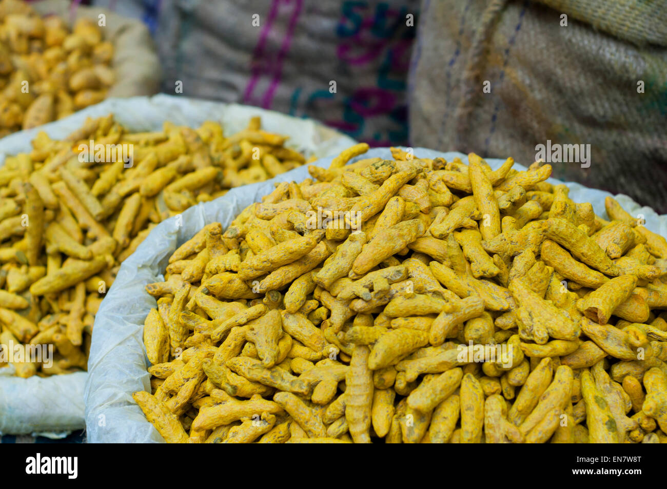 Sacks of turmeric root for sale at the market Stock Photo Alamy