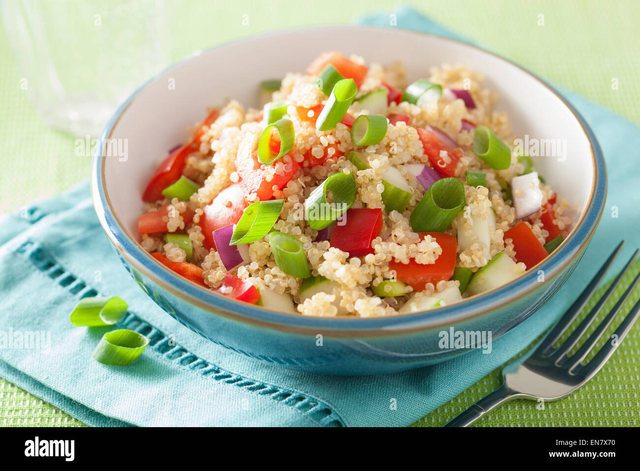 healthy couscous salad with tomato cucumber onion chives Stock Photo