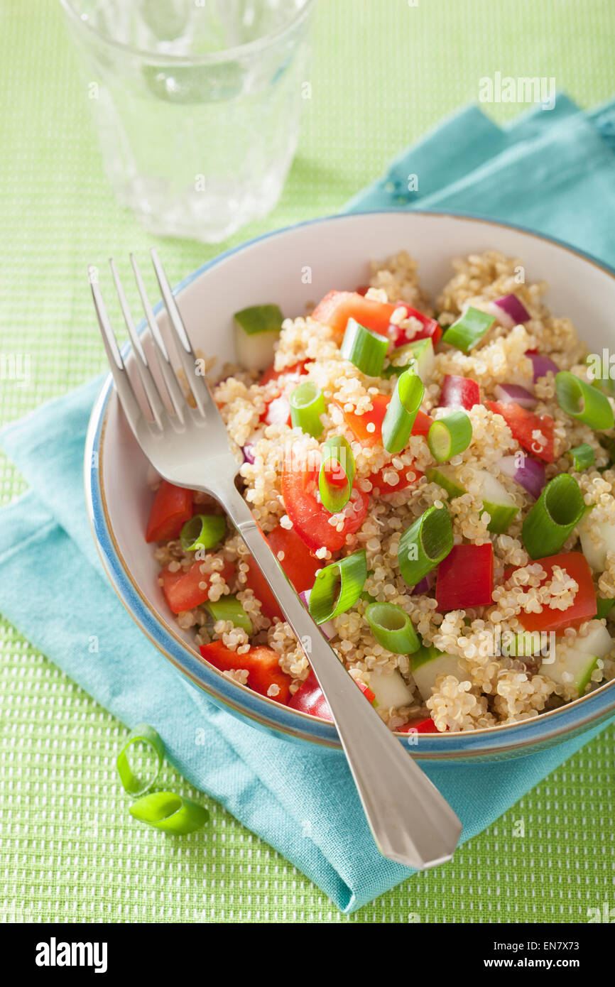 healthy couscous salad with tomato cucumber onion chives Stock Photo