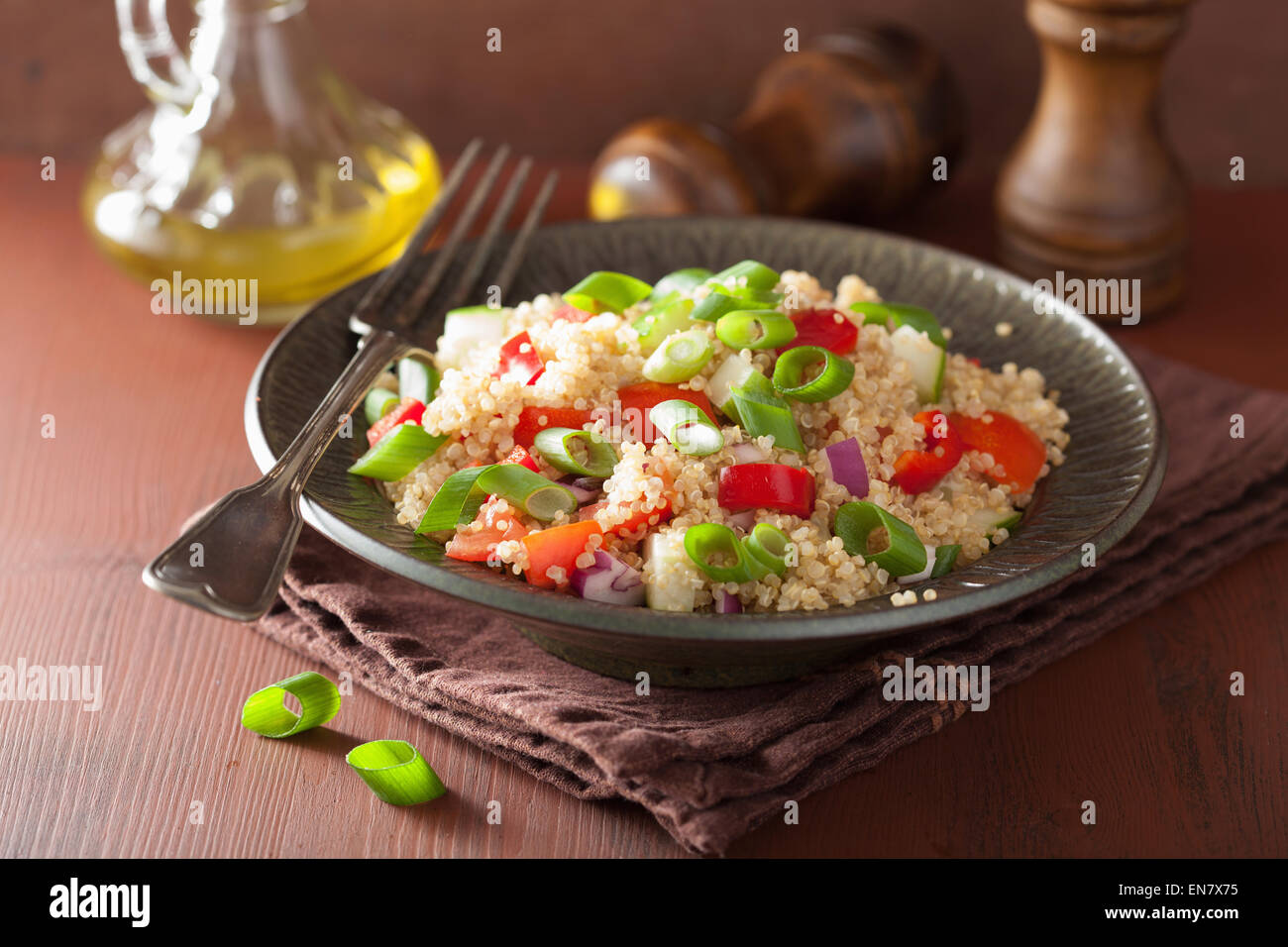 healthy couscous salad with tomato cucumber onion chives Stock Photo