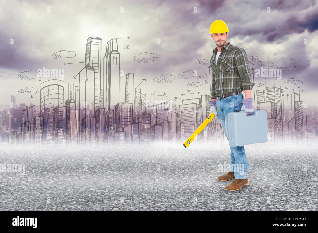 Composite image of manual worker with spirit level and toolbox Stock Photo