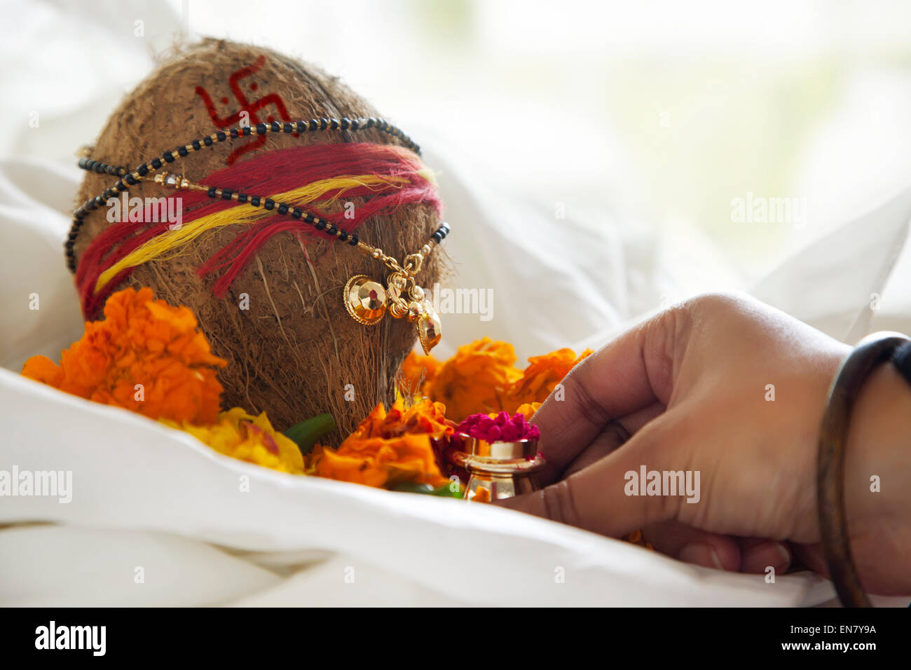 WoMans hand performing rituals Stock Photo