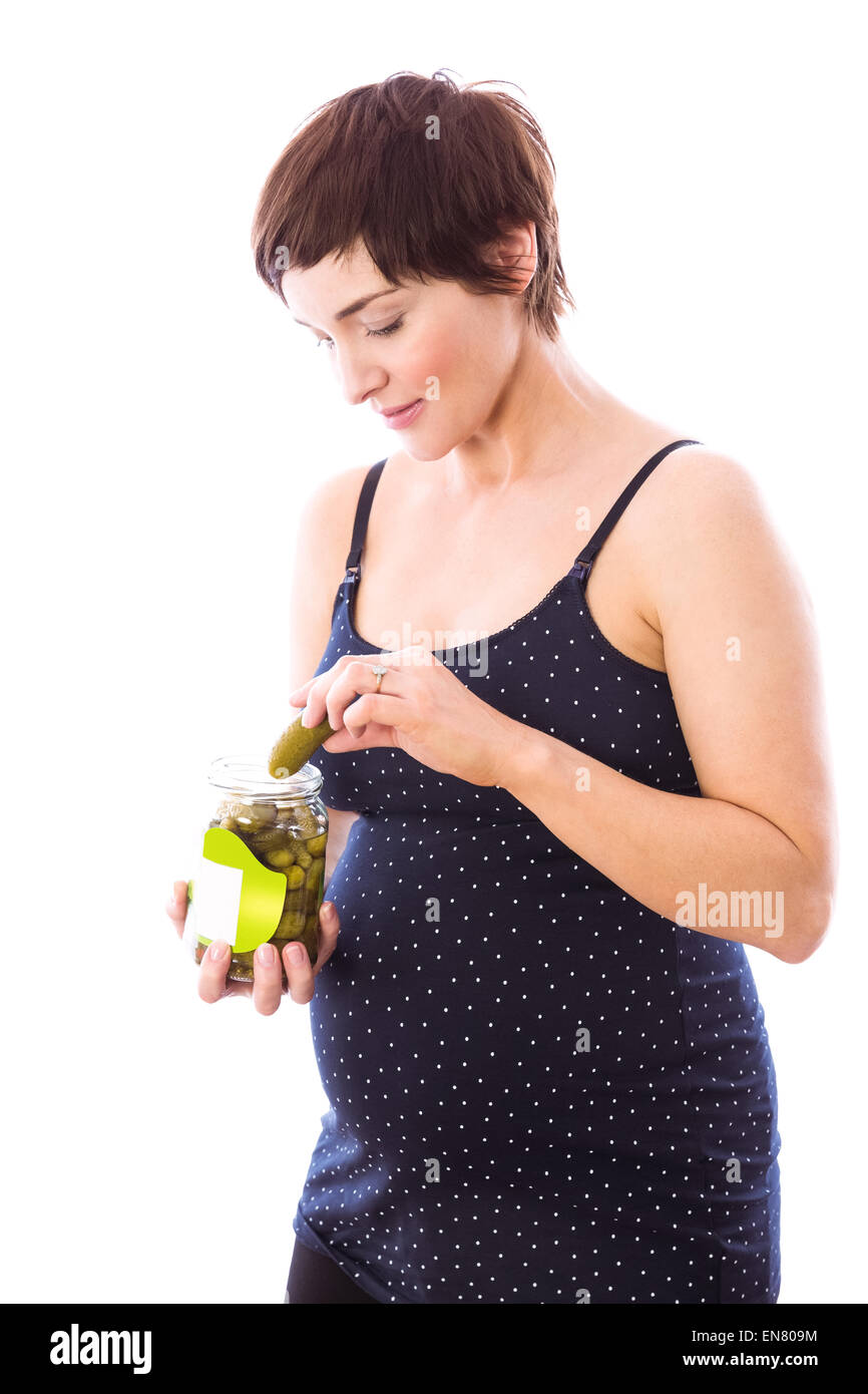 Pregnant woman eating jar of pickles Stock Photo Alamy
