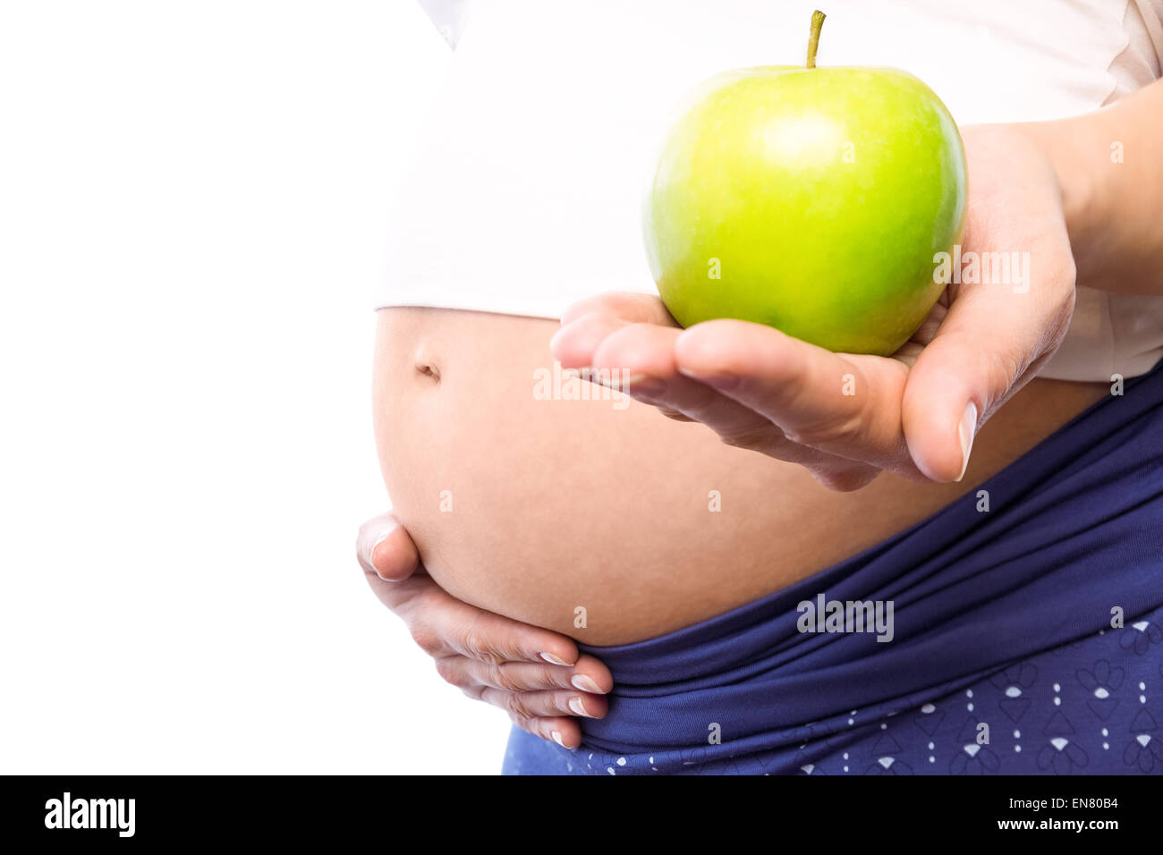 Pregnant woman holding green apple Stock Photo Alamy
