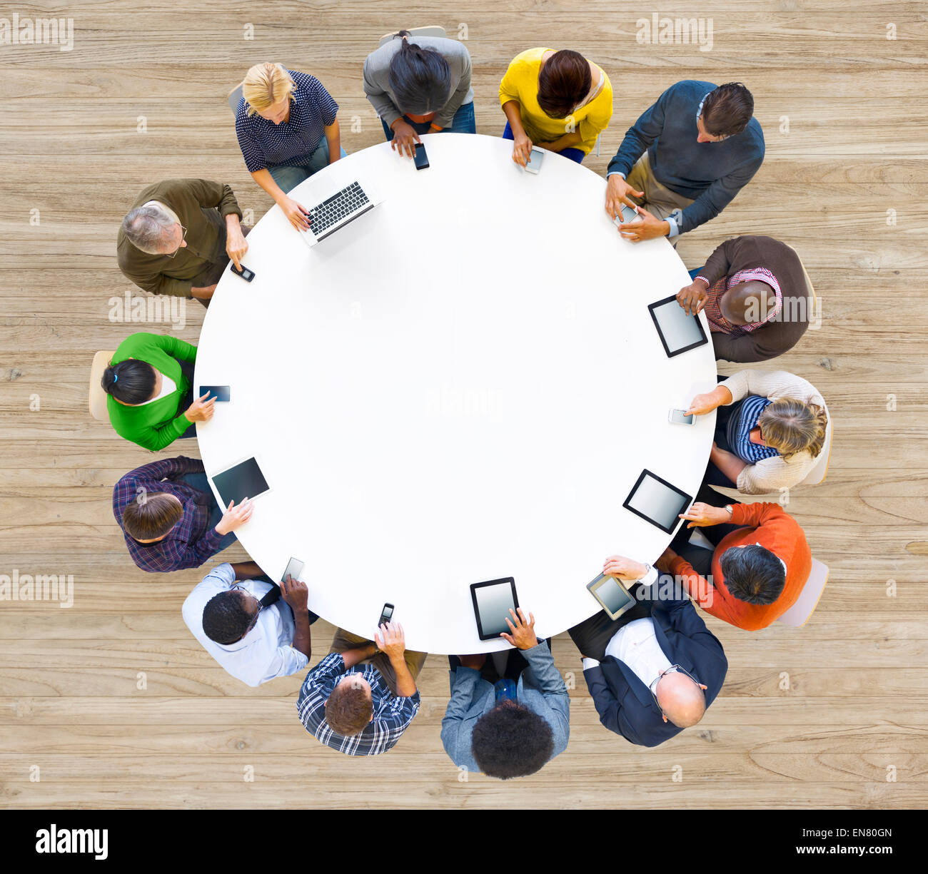 Group of Multiethnic People Using Digital Devices Stock Photo