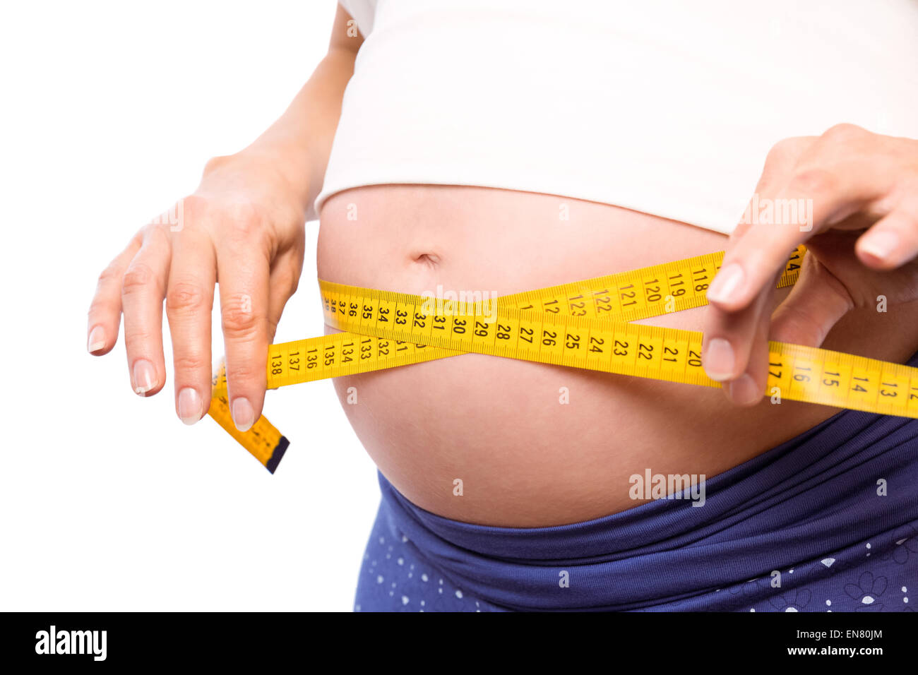 Pregnant woman measuring bump hires stock photography and images Alamy