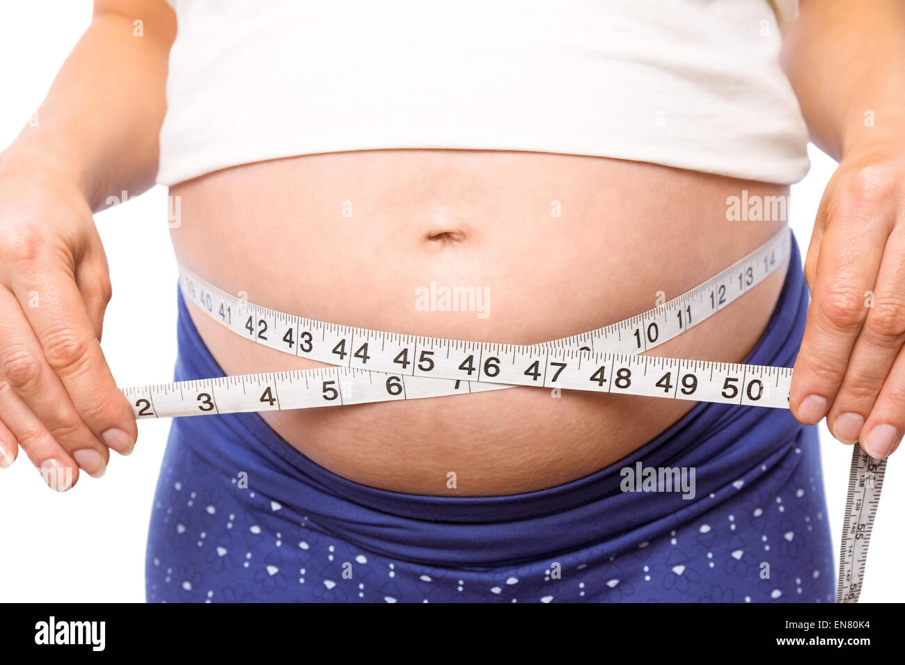 Pregnant woman measuring her bump Stock Photo Alamy