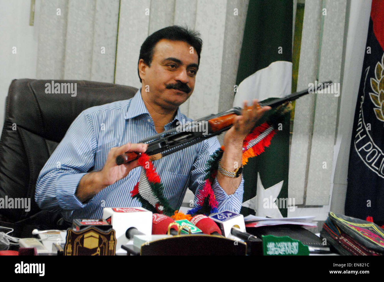 Incharge CIA Hyderabad DSP Aslam Langah addresses to media persons during press conference at his office in Hyderabad on Wednesday, April 29, 2015. Stock Photo