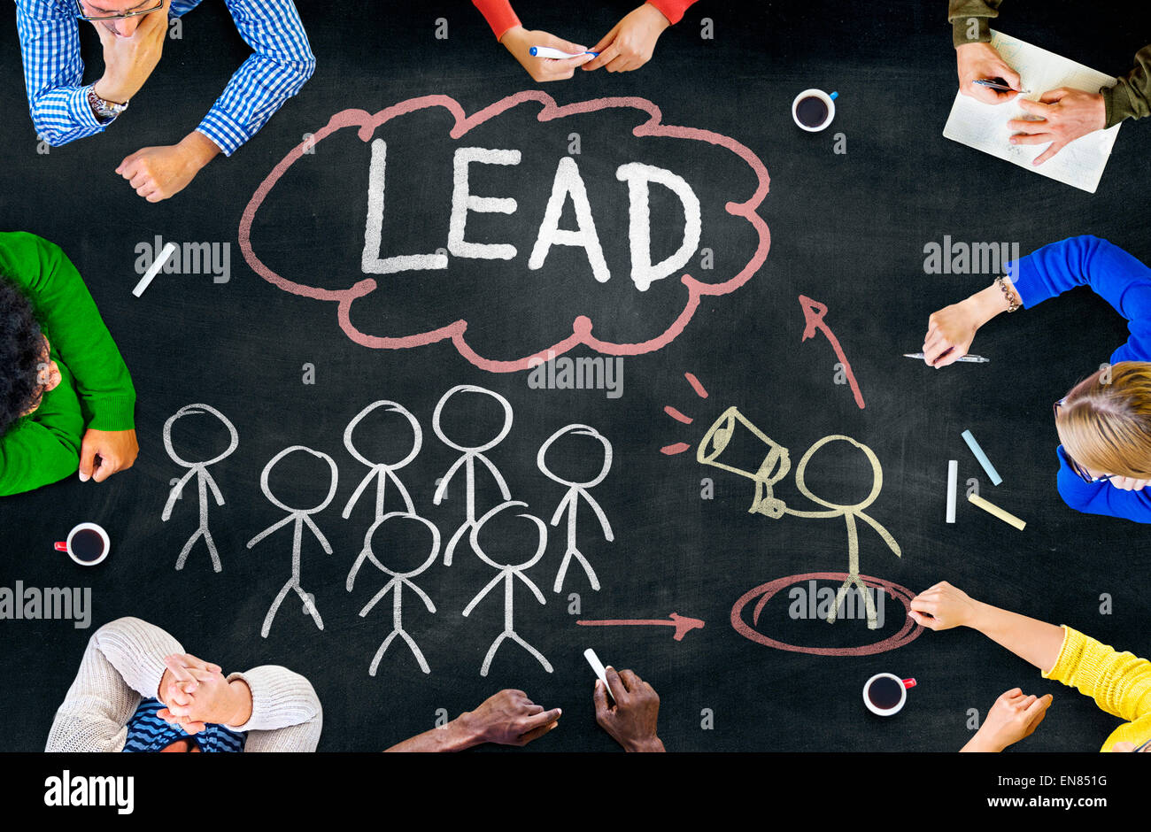 People in a Meeting and Leadership Ideas Stock Photo