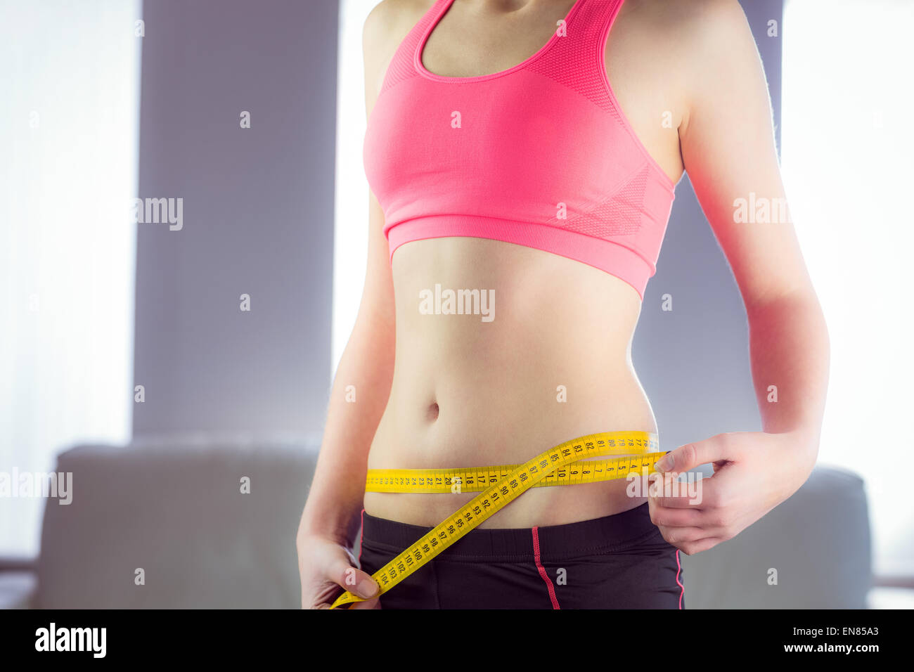 Waist measuring tape hi-res stock photography and images - Alamy