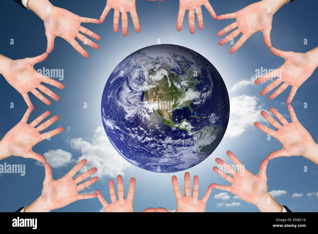 Composite image of circle of hands Stock Photo